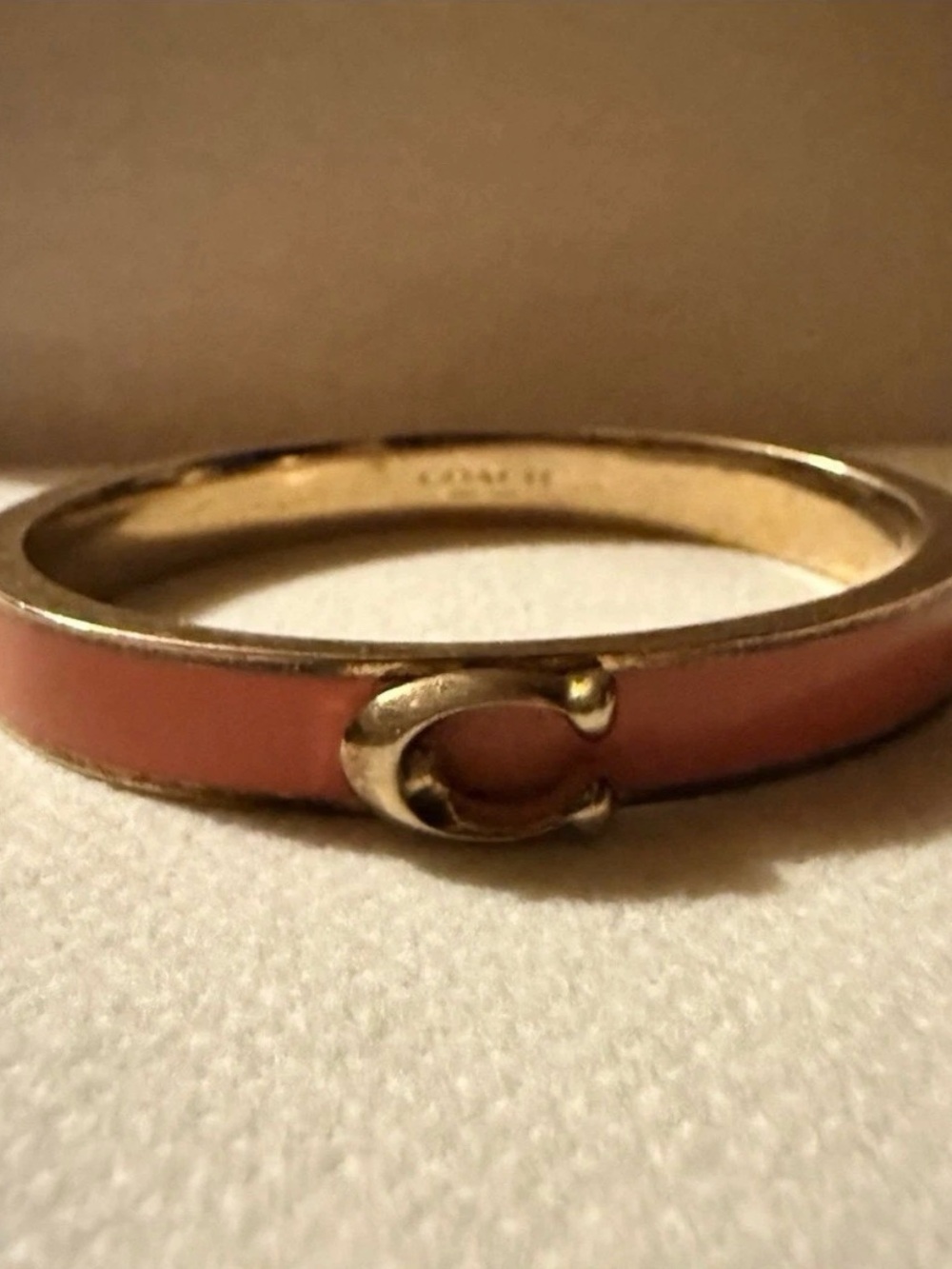 Coach Signature Gold-Tone Bangle with Pink Enamel Inlay - Picture 5 of 5